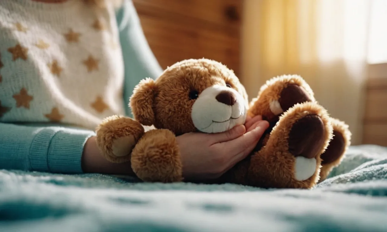 A close-up photograph captures the worn-out hands of an adult clutching a beloved stuffed animal, showcasing the nostalgia, comfort, and innocent joy that these cuddly companions bring to their lives.